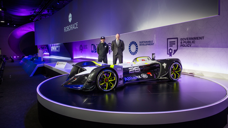 Sverdlov and Simon with a Roborace car. Image via Roborace